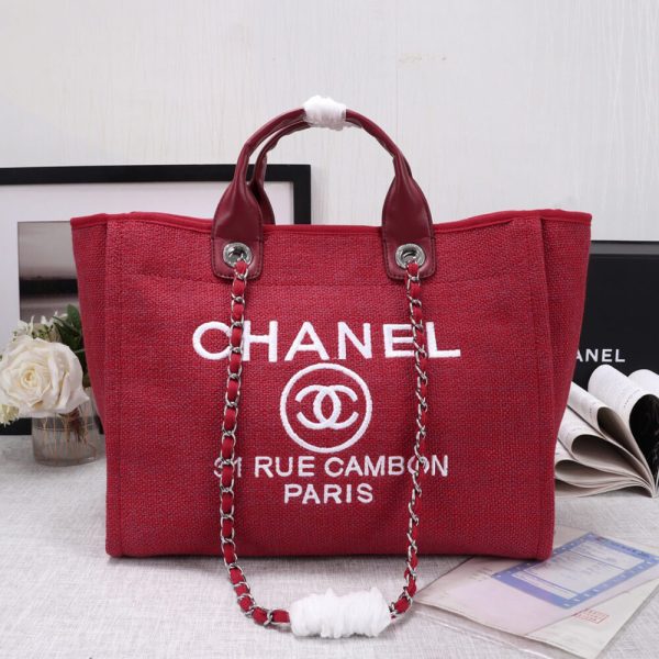Ch*el woven straw raffia striped medium deauville tote