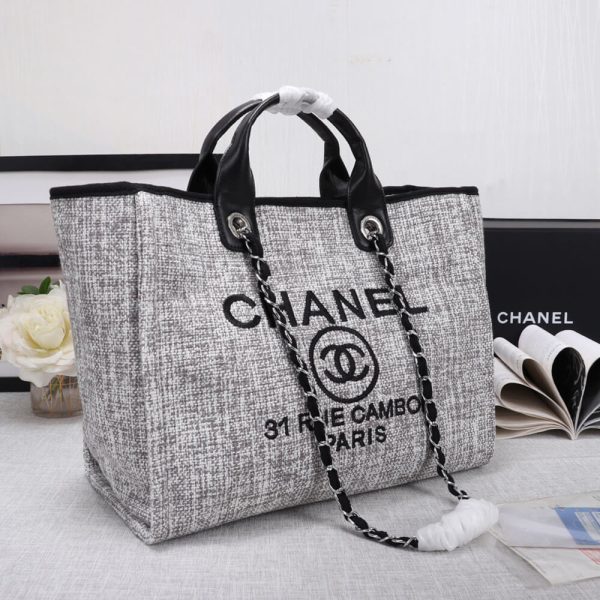 Ch*el woven straw raffia striped medium deauville tote